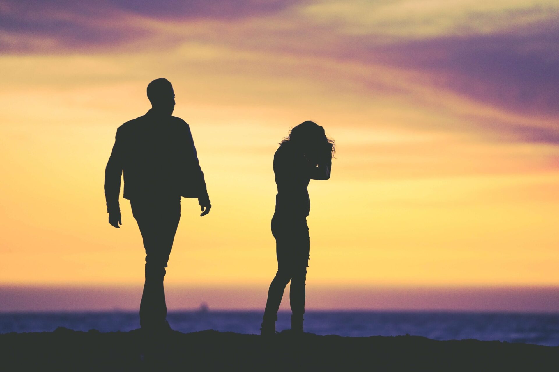 Don't Compromise on Emotional Wellbeing (1) Image representing a Boulder couple on couch having an animated discussion